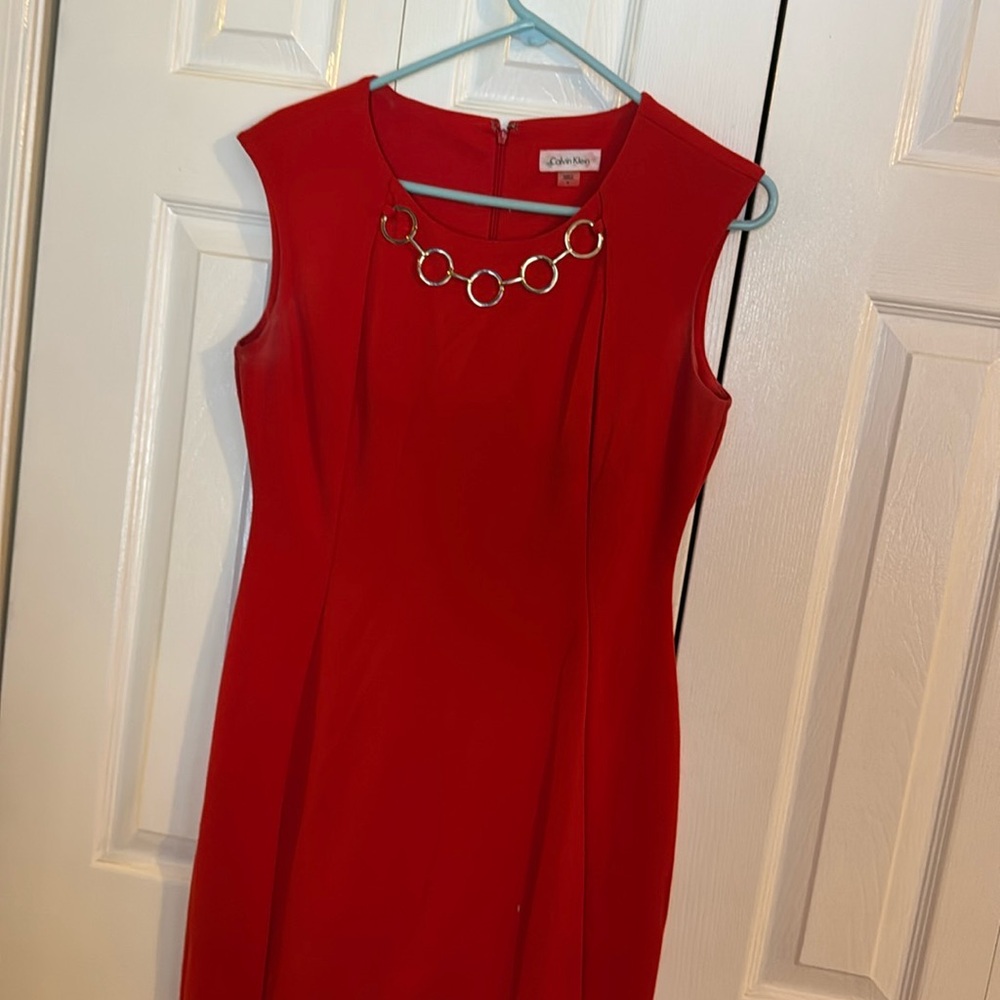 Calvin Klein red dress.